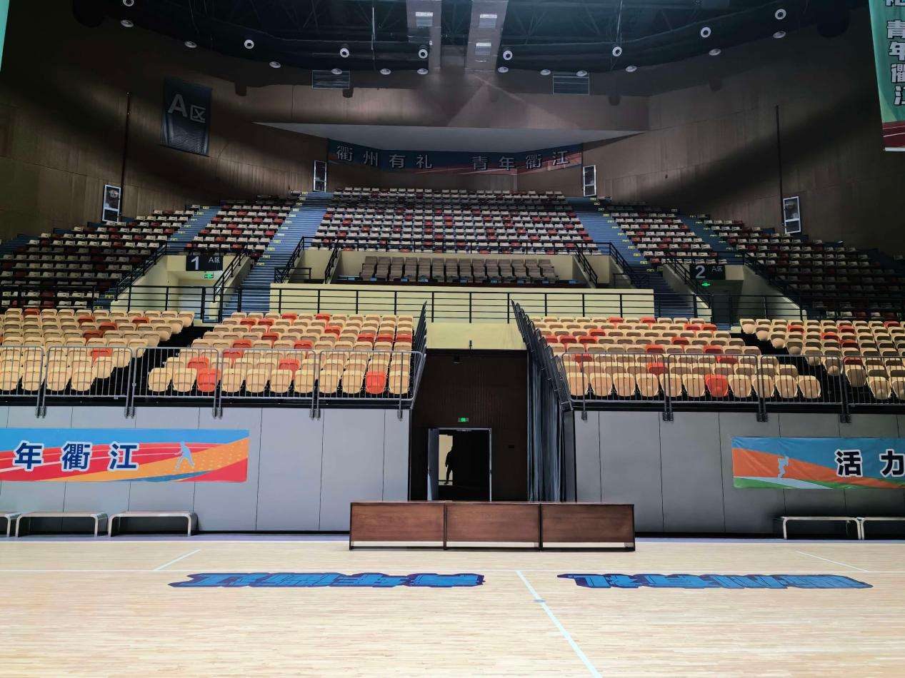A full seating field in an indoor arena